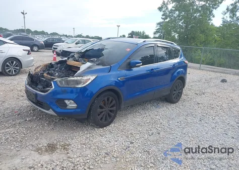 2017 Ford Escape Titanium from USA, damaged, VIN 1FMCU9J99HUC64515